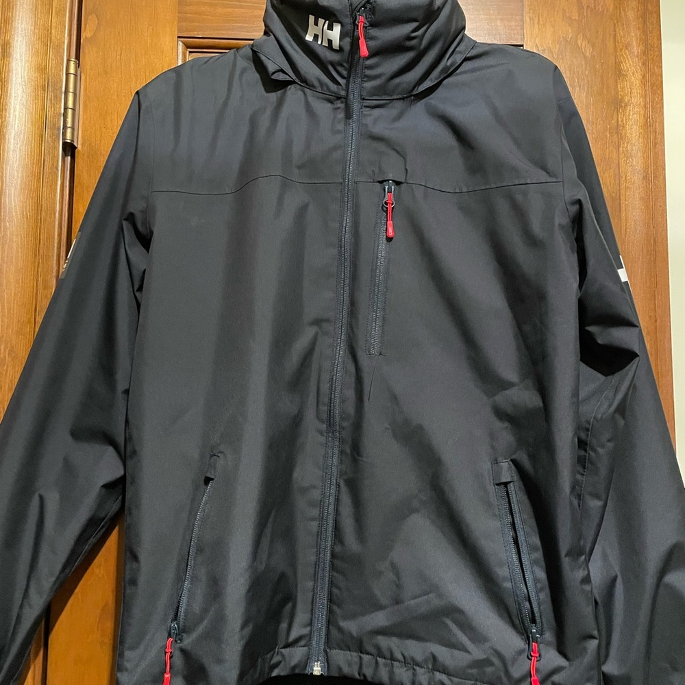 Helly Hansen Black rain/performance jacket.